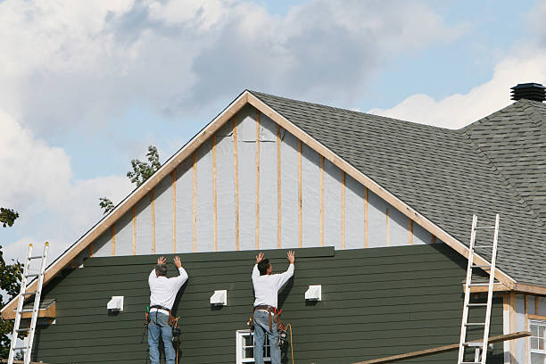 Professional Siding Installation technician working in Madison, MD